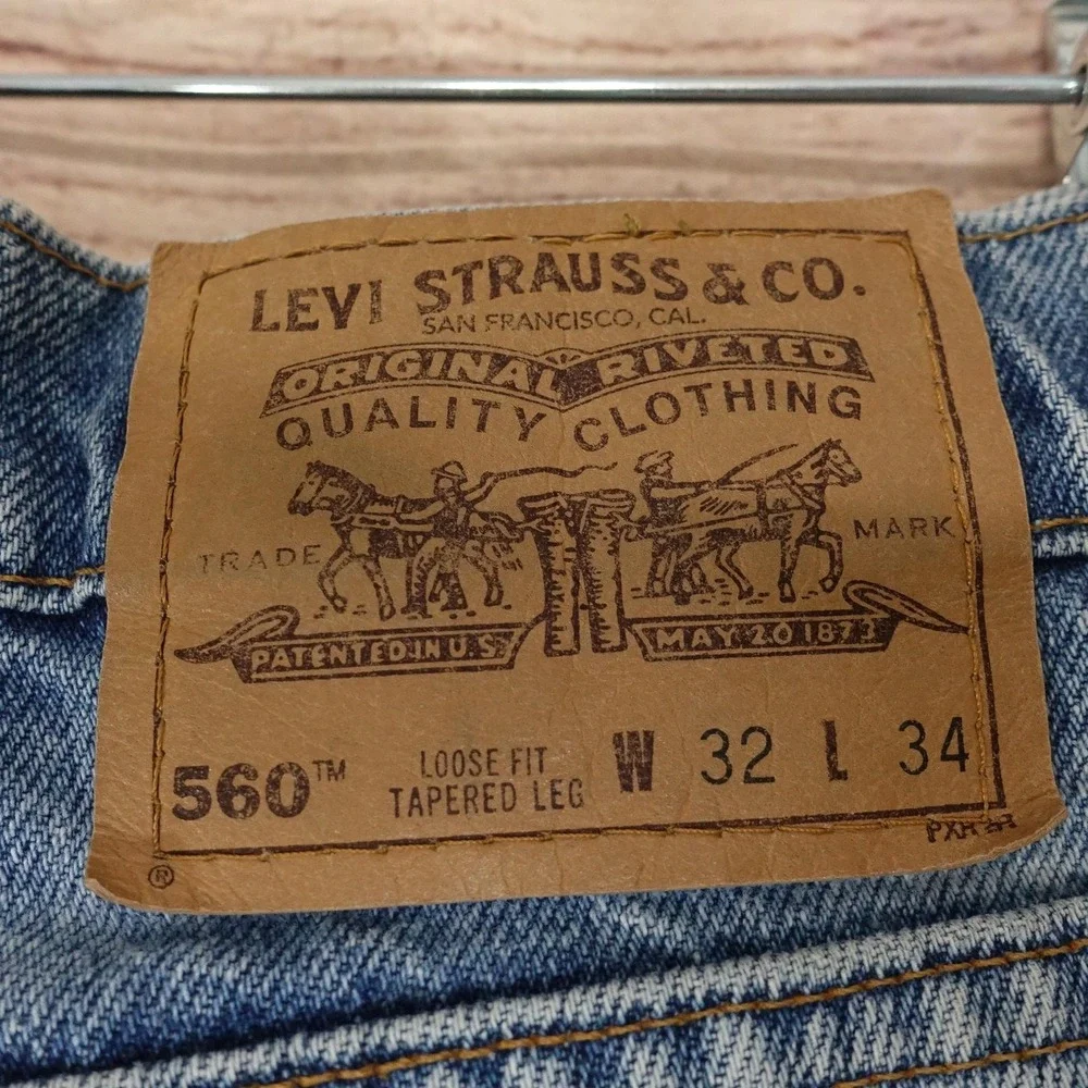 Vintage Levis 560 Jeans 32x34 (31x33) Blue Loose Tapered USA Orange Tab